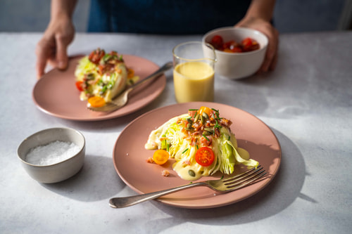Loaded wedge salad with honey Dijon yoghurt dressing