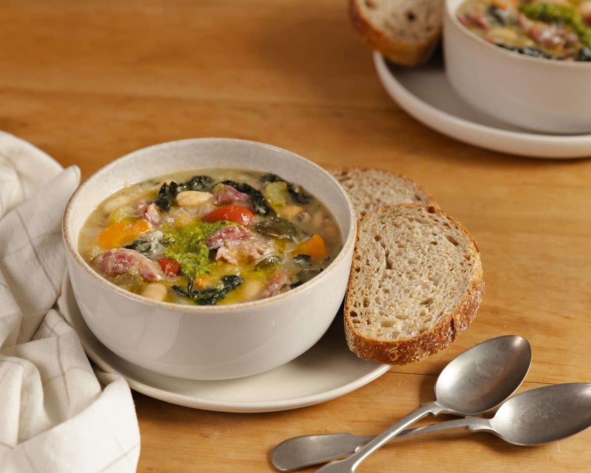 Tuscan style hearty vegetable soup with bacon hock